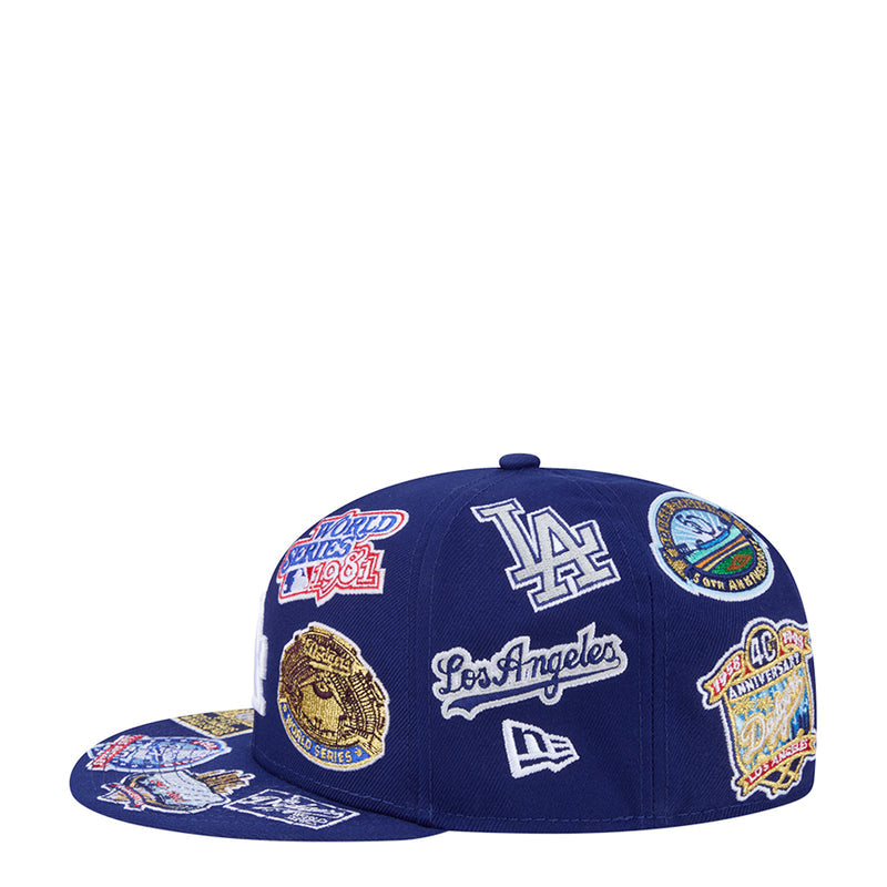 Royal blue Dodgers baseball cap with LA logo and round championship patches