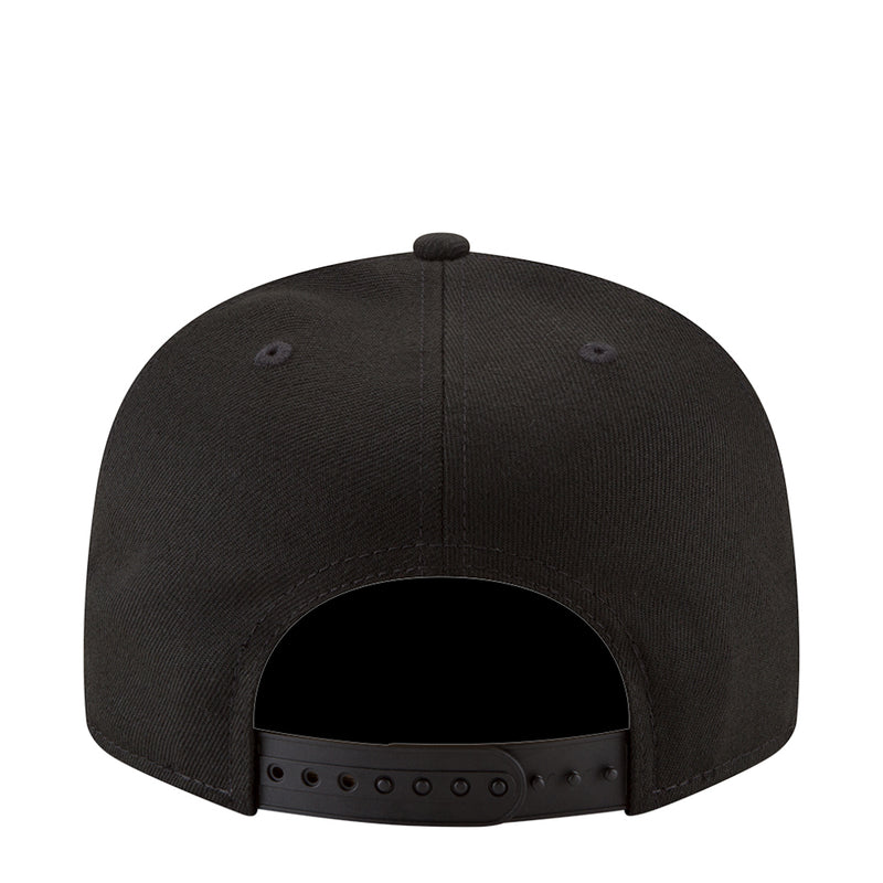 Black baseball cap back view with adjustable strap and ventilation holes