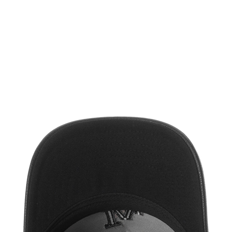 Black baseball cap crown with curved brim, textured fabric and stitched panels