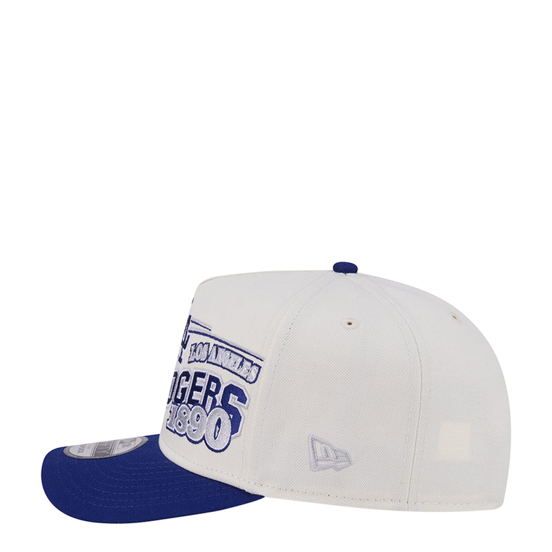 Two-tone baseball cap with LA Dodgers graphic, white crown and blue brim