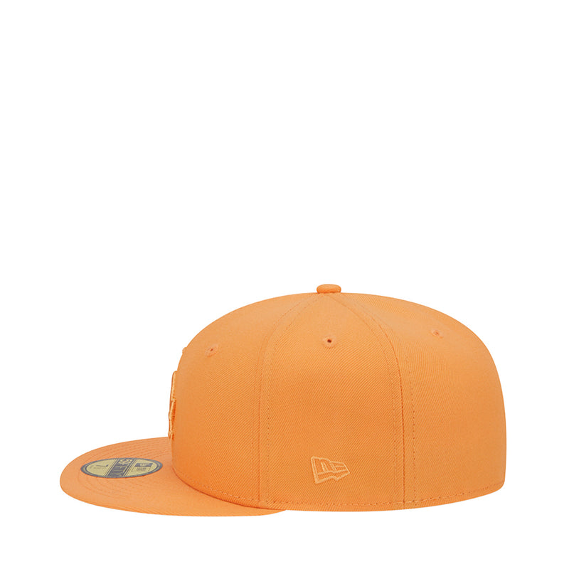 Orange baseball cap with New Era flag logo and flat brim