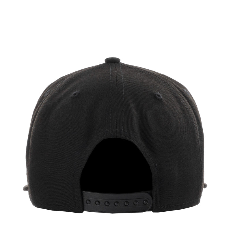 Black baseball cap back view with adjustable strap and ventilation eyelets