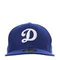 Royal blue baseball cap with white Dodgers D logo on the front panel