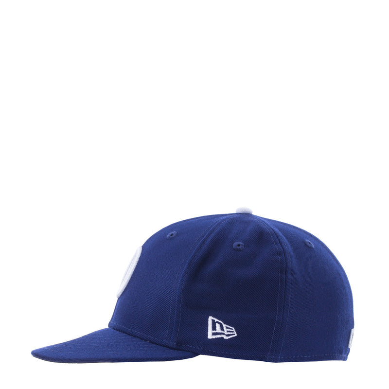 Royal blue baseball cap with small white New Era logo on the front