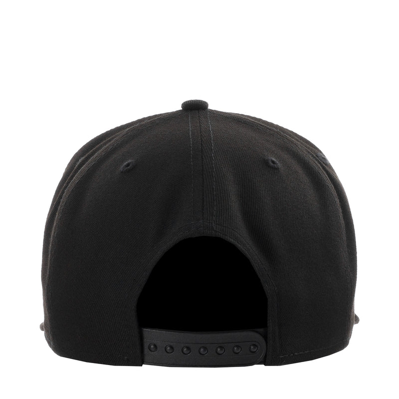 Black baseball cap back view with adjustable strap and ventilation eyelets