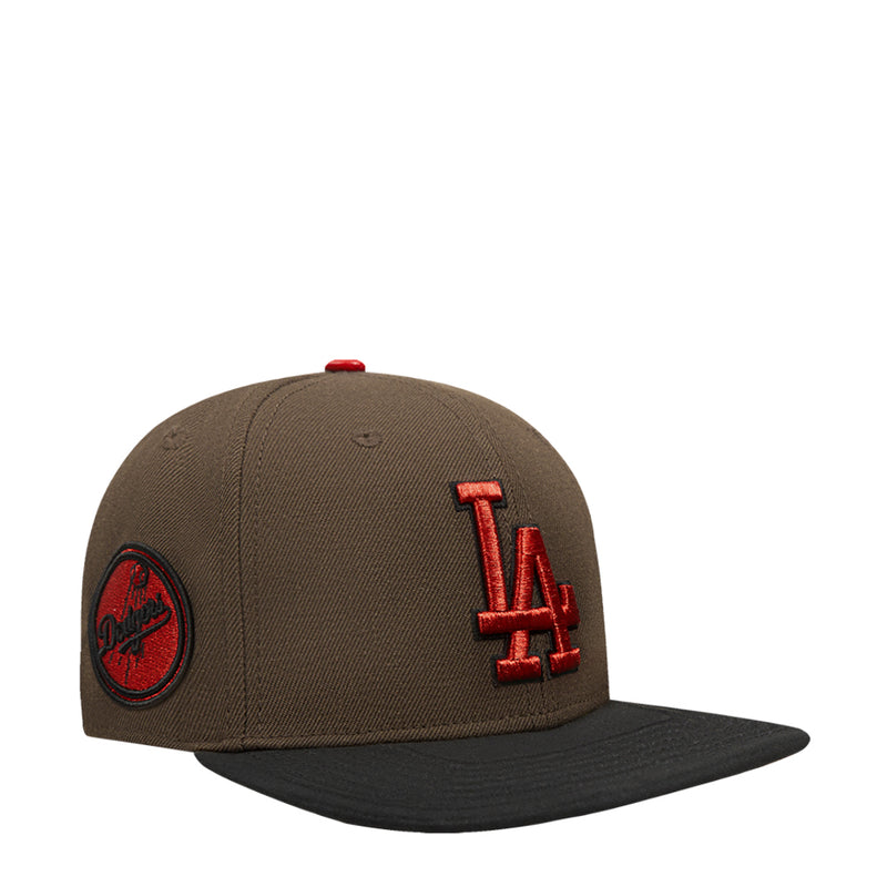 Two-tone strapback cap, brown crown with red LA logo and black side patch