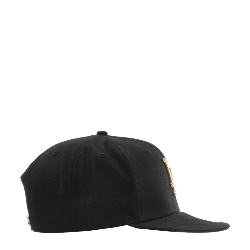 Black baseball cap with gold side logo detail