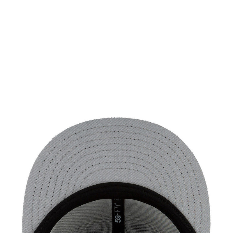 Baseball cap brim close-up with black trim and stitched panels