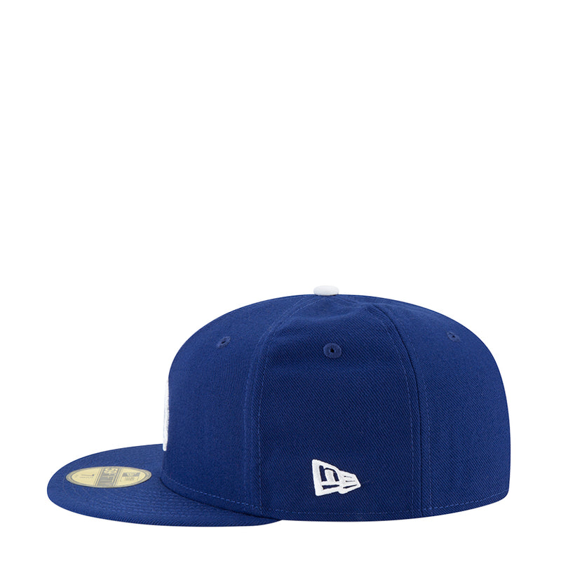 Royal blue baseball cap with New Era flag patch on side