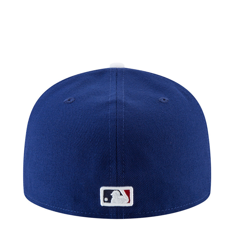 Royal blue baseball cap with MLB logo patch on back