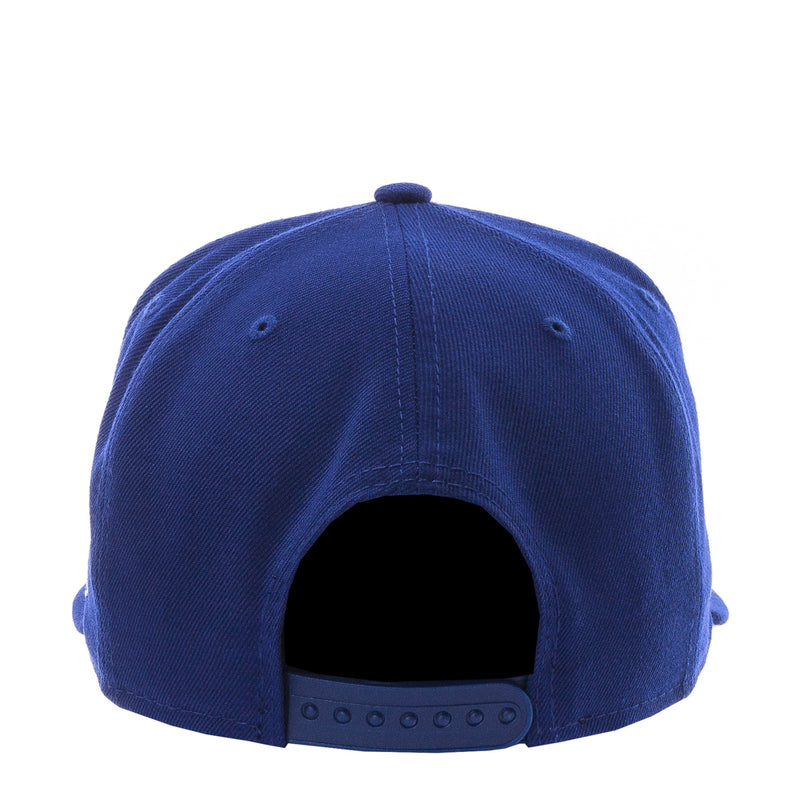 Royal blue baseball cap with stitched crown seams and adjustable back strap