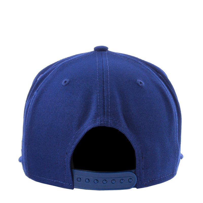 Royal blue baseball cap back view with eyelets and adjustable snapback strap