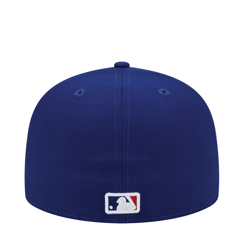 Royal blue baseball cap with MLB logo patch on back