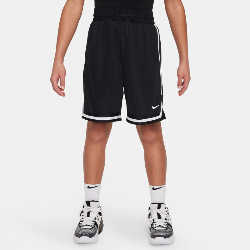 Youth black shorts with white side stripes and Nike logo at right leg