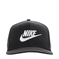 Black Nike snapback cap with white Swoosh logo