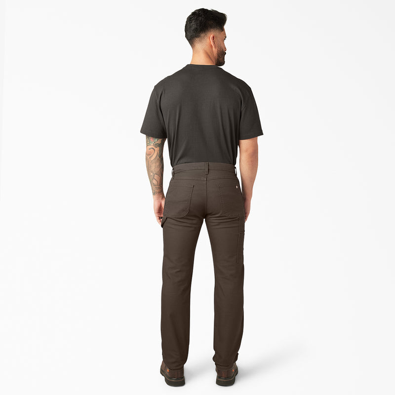 Back view of dark brown carpenter pants with belt loops and straight legs.