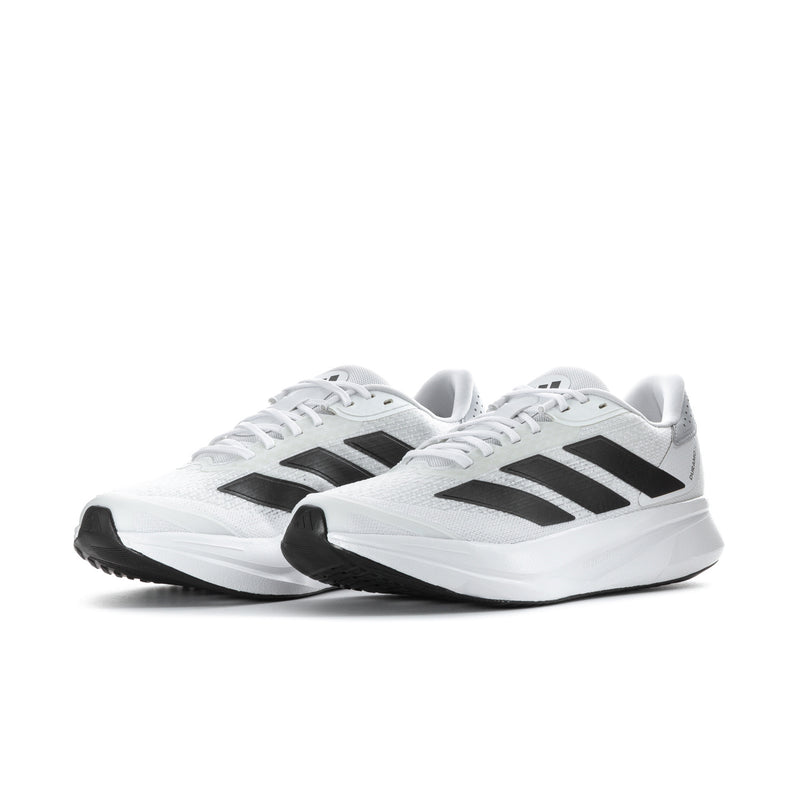 Men's white running shoes, side view with black stripes and cushioned midsole