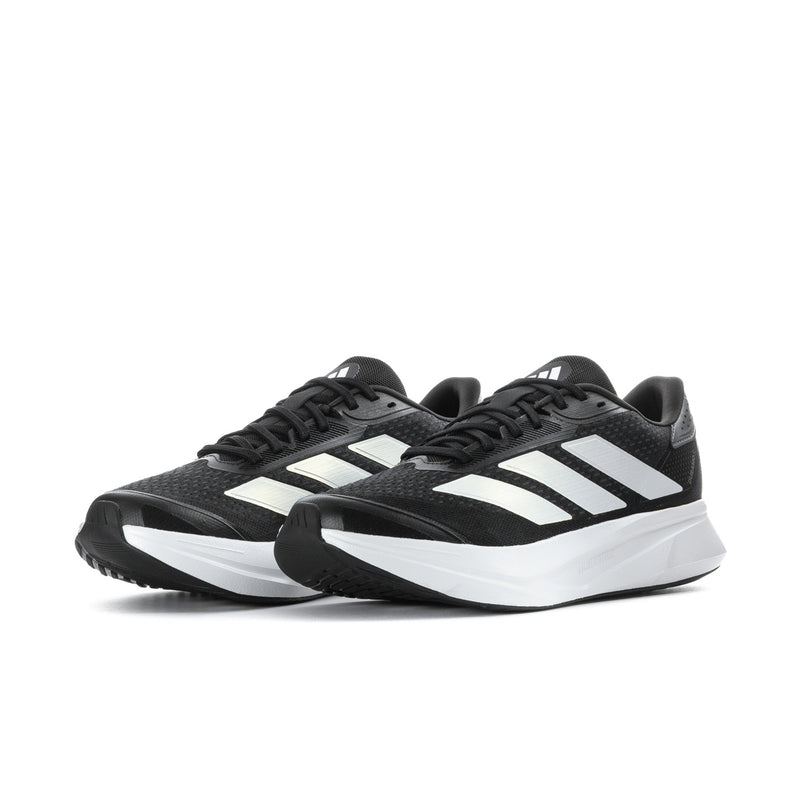 Pair of black men's running sneakers with white stripe accents and white midsoles