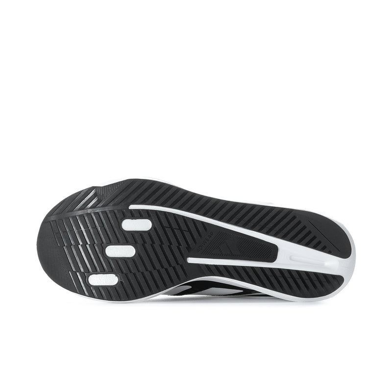 Black rubber outsole with white midsole edge and traction grooves