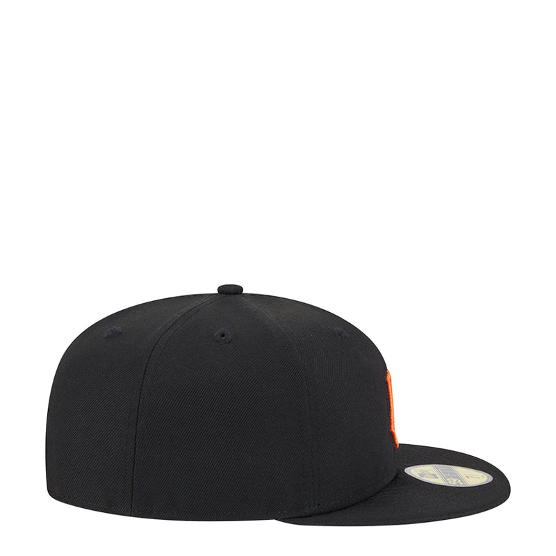 Black baseball cap with curved brim and small orange logo detail at side