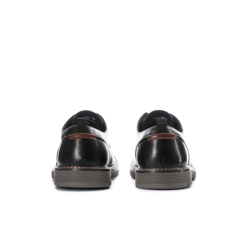 Men's black leather lace-up shoes, heel back view, stacked sole with stitched trim