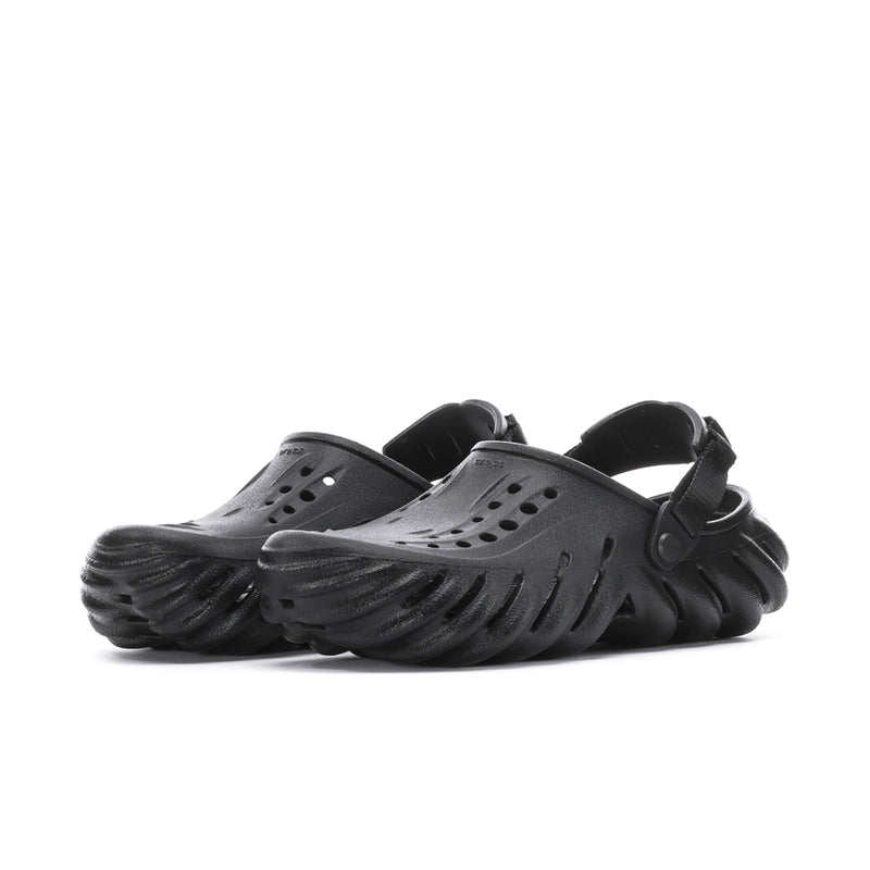 Men's black clog sandal, side view with textured ridged sole