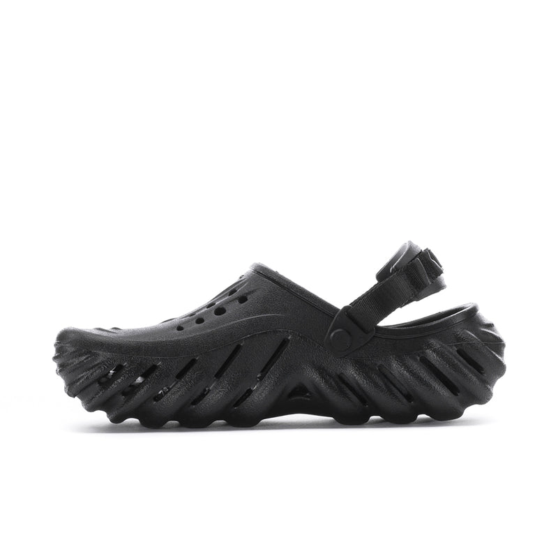 Men's black clog with perforations, ridged sidewall, and strap detail