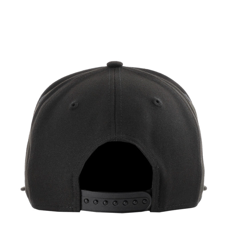Black baseball cap with vented back panel and snapback strap underside