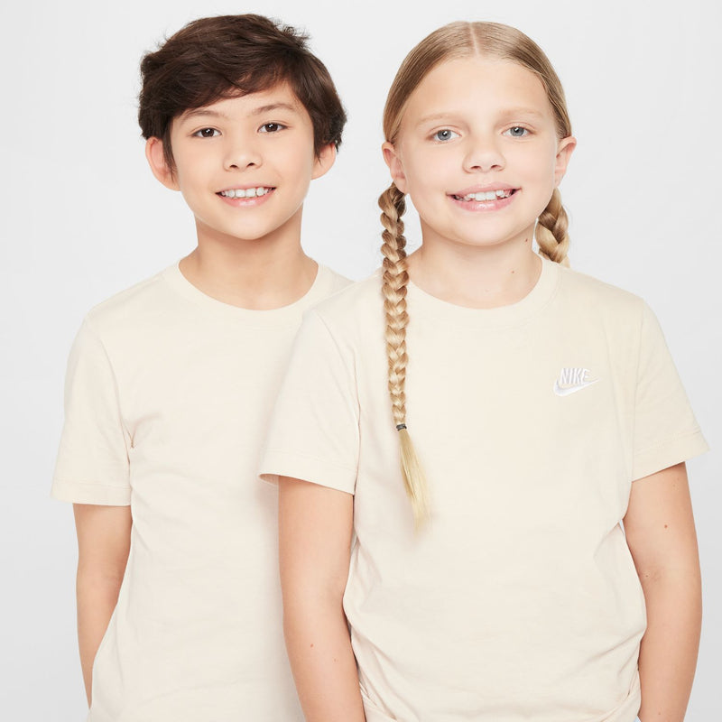 Youth sandrift embroidered tee with chest Nike logo, close-up front