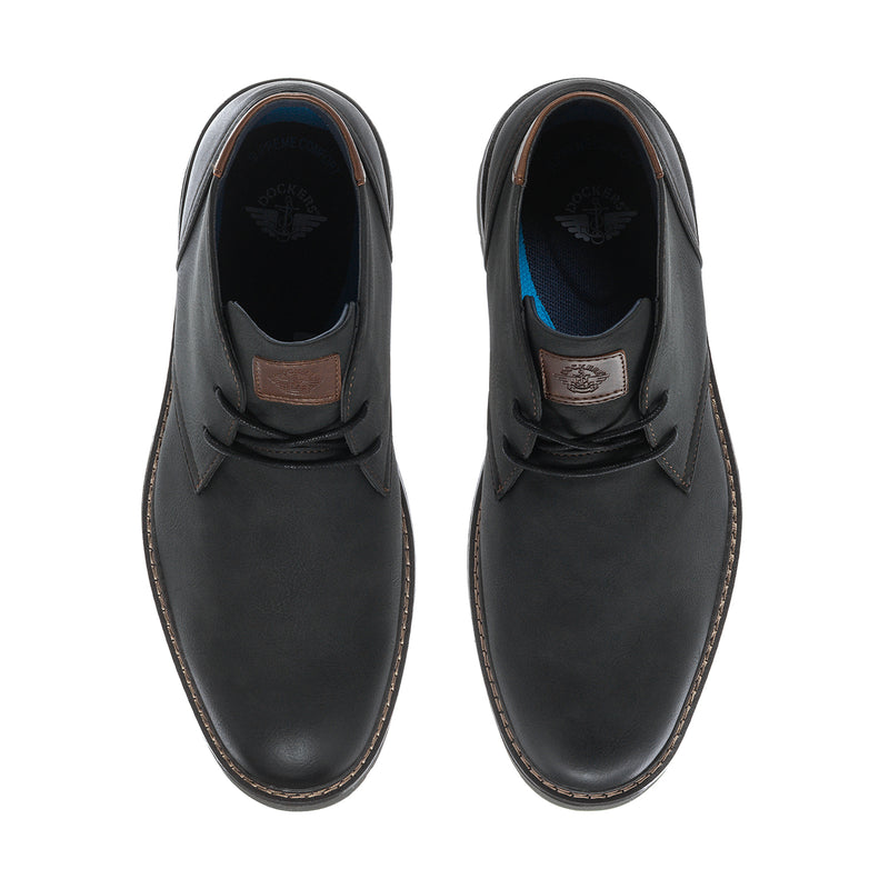 Men's black chukka boots, front view with lace-up and brown trim