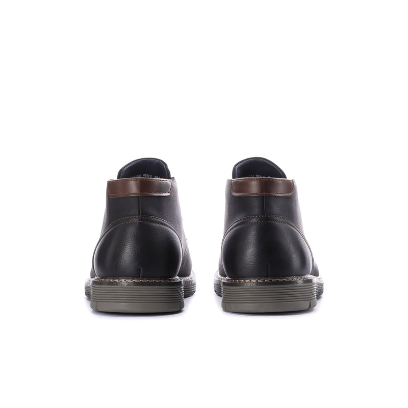 Men's black chukka boots, back view with brown heel loop and rugged sole