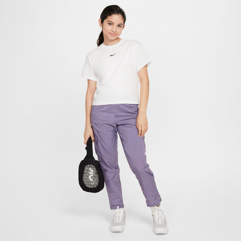 Youth white boxy T-shirt with Nike swoosh on front; short sleeves, crew neck