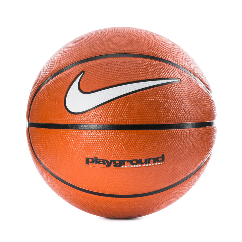 Nike basketball with amber-orange textured cover, black seams, and white swoosh logo