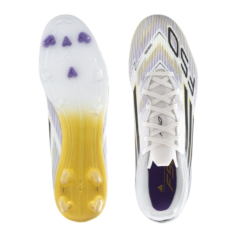 Pair of white football cleats showing purple studs and gold-tinted sole base, front view.