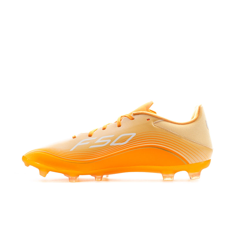 Men's low-top soccer cleat side view, cream upper with orange striping and studs