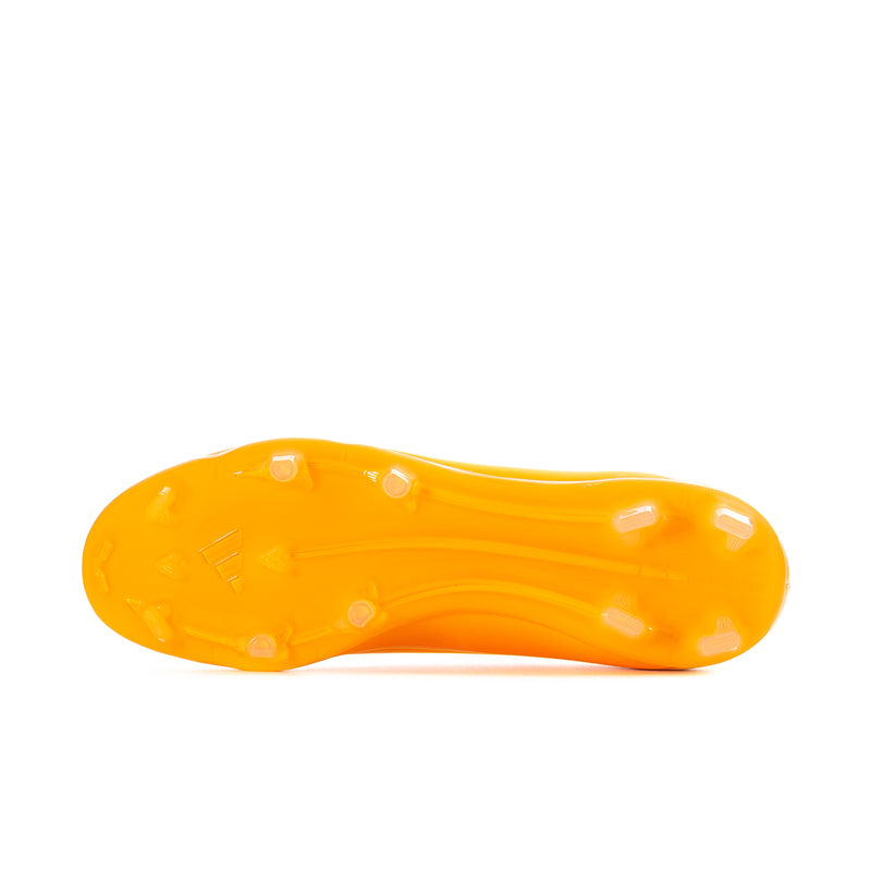Men's low-top soccer cleat outsole in bright orange with molded traction studs