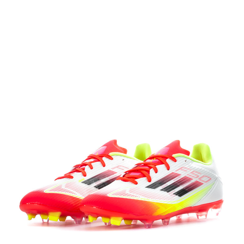 White/red/yellow soccer cleat, front 3/4 view, low-top lace-up and studded outsole