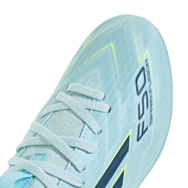 Youth soccer cleat close-up: light blue upper with laces and side logo detail
