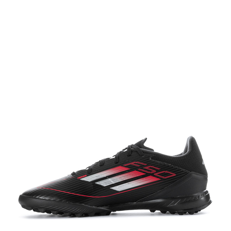 Men's black soccer cleat with red and white speedline graphic on upper