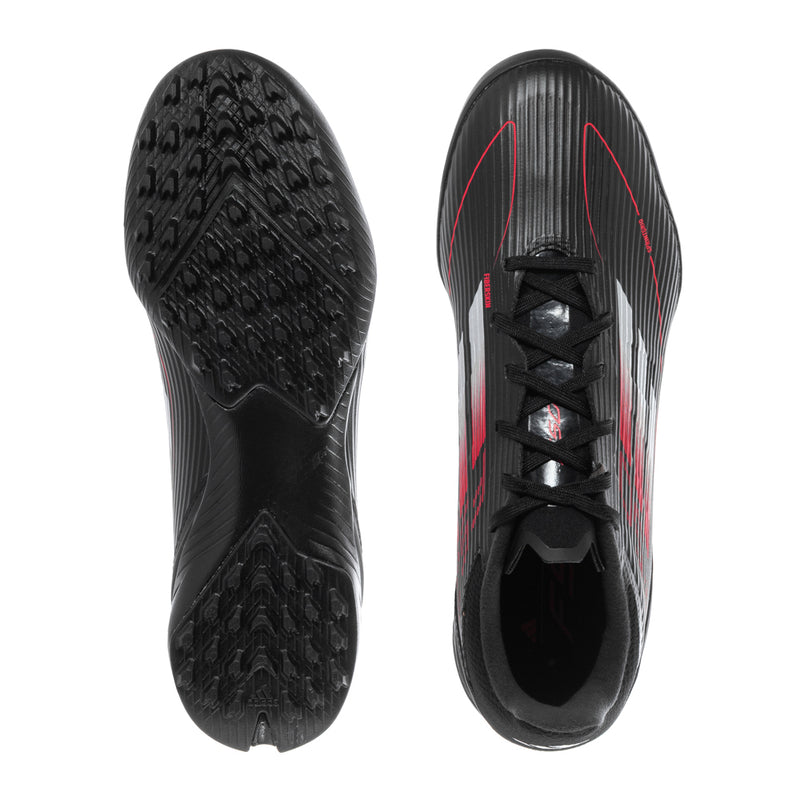 Men's soccer cleat soles, black outsole with molded traction studs and grooves