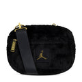 Black faux fur camera bag with gold Jumpman logo patch, flap front and crossbody strap