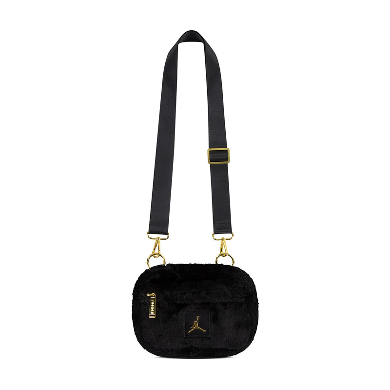 Black faux fur mini camera bag with two-point crossbody strap and gold clasp accents