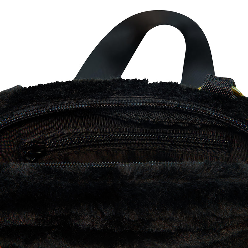 Black faux fur camera bag top view with black zipper and curved carry handle