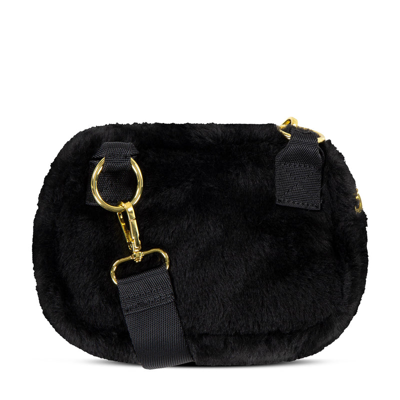 Black faux fur camera bag with gold D-ring hardware and adjustable shoulder strap