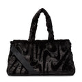 Black faux fur tote bag with top handles and diagonal front strap