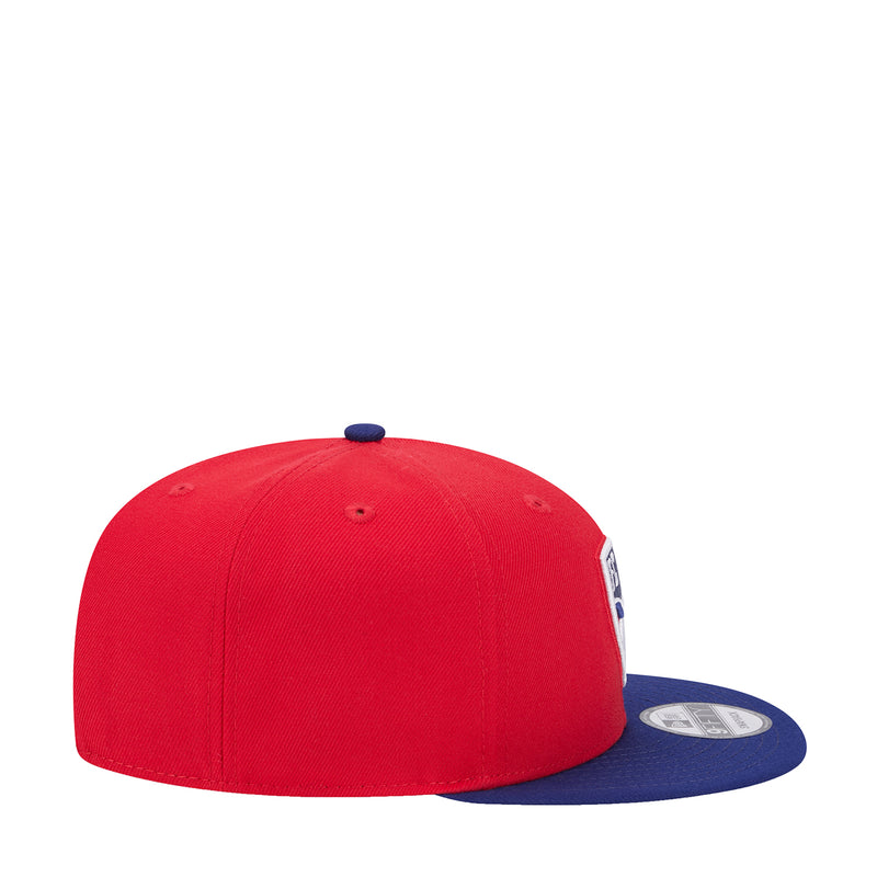 FC Dallas two-tone cap with red crown and blue brim, small side logo