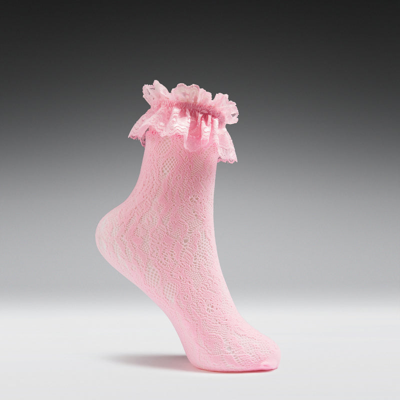Pink lace sock with ruffled top on a gray background