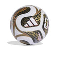 White and black soccer ball with gold graphics and FIFA logo panels