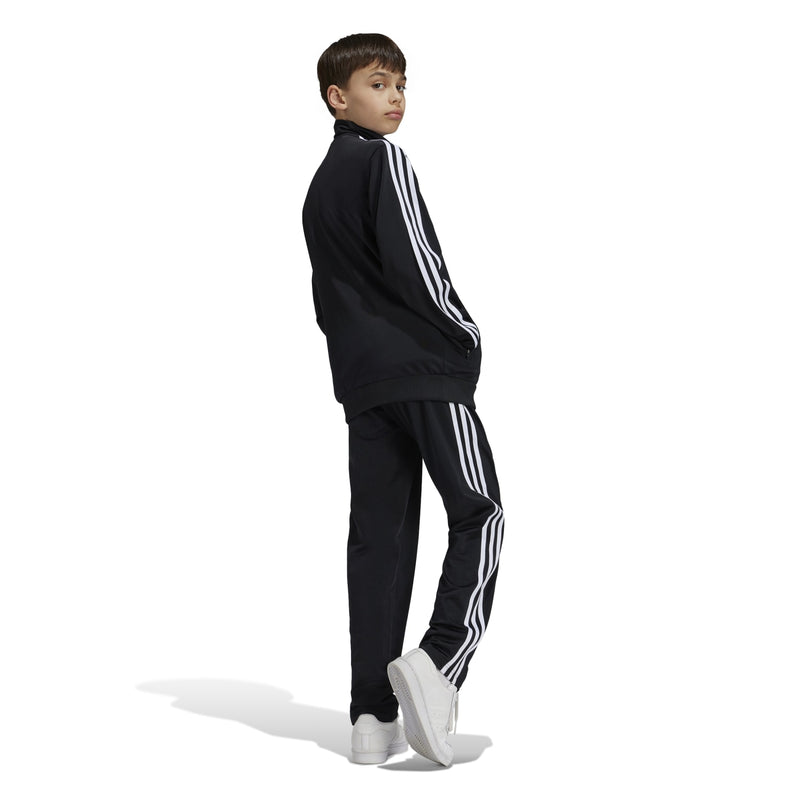 Youth black track pants with white stripe down the outer leg and elastic hem