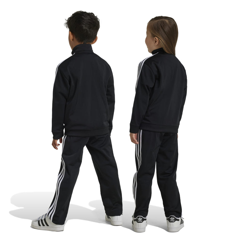 Kids black track set with white stripes, back view of jacket and matching pants
